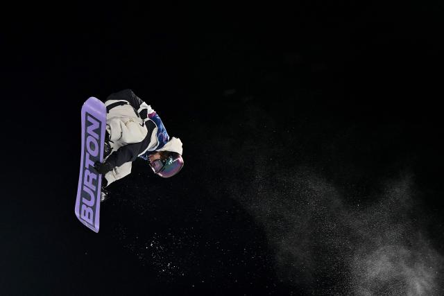 Japan's Taiga Hasegawa competes in the snowboard men's big air qualification run 2 during the Milano Cortina 2026 Winter Olympic Games at Livigno Snow Park, in Livigno (Valtellina), on February 5, 2026. (Photo by Jeff PACHOUD / AFP)