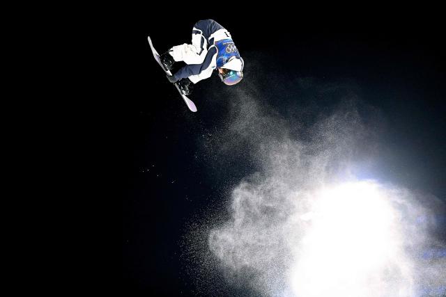 Japan's Taiga Hasegawa competes in the snowboard men's big air qualification run 2 during the Milano Cortina 2026 Winter Olympic Games at Livigno Snow Park, in Livigno (Valtellina), on February 5, 2026. (Photo by Kirill KUDRYAVTSEV / AFP)