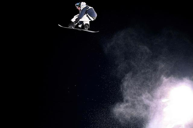 Japan's Taiga Hasegawa competes in the snowboard men's big air qualification run 2 during the Milano Cortina 2026 Winter Olympic Games at Livigno Snow Park, in Livigno (Valtellina), on February 5, 2026. (Photo by Kirill KUDRYAVTSEV / AFP)