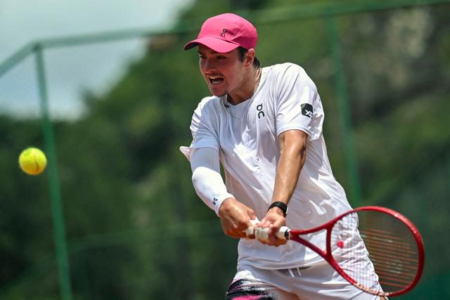 Brazilian tennis player Joao Fonseca gestures as he hits the ball during a training session open to media at the Itanhanga Golf Club in Rio de Janeiro, Brazil, on February 05, 2026. (Photo by MAURO PIMENTEL / AFP)