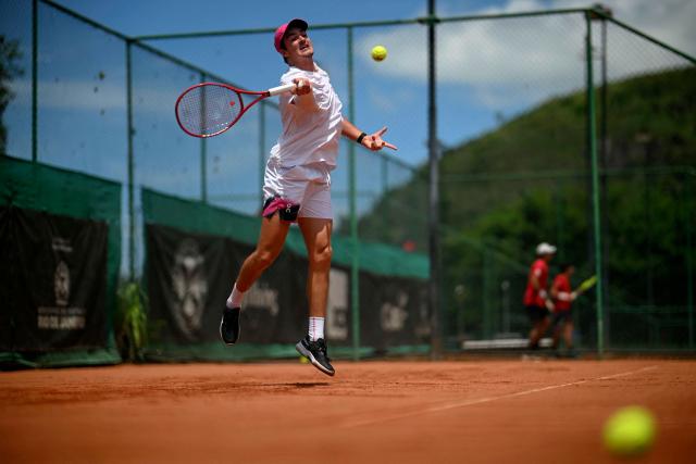 Brazilian tennis player Joao Fonseca gestures as he hits the ball during a training session open to media at the Itanhanga Golf Club in Rio de Janeiro, Brazil, on February 05, 2026. (Photo by MAURO PIMENTEL / AFP)