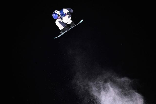 Japan's Hiroto Ogiwara competes in the snowboard men's big air qualification run 2 during the Milano Cortina 2026 Winter Olympic Games at Livigno Snow Park, in Livigno (Valtellina), on February 5, 2026. (Photo by Kirill KUDRYAVTSEV / AFP)
