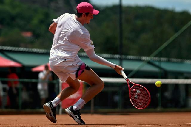 Brazilian tennis player Joao Fonseca returns the ball during a training session open to media at the Itanhanga Golf Club in Rio de Janeiro, Brazil, on February 05, 2026. (Photo by MAURO PIMENTEL / AFP)