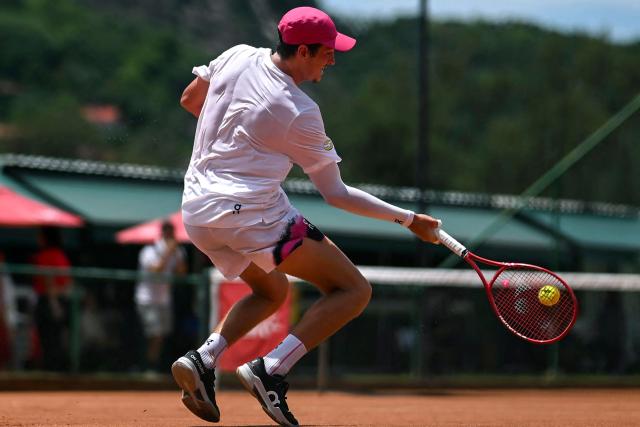 Brazilian tennis player Joao Fonseca returns the ball during a training session open to media at the Itanhanga Golf Club in Rio de Janeiro, Brazil, on February 05, 2026. (Photo by MAURO PIMENTEL / AFP)