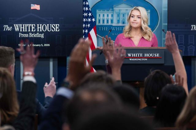 Reporters raise their hands to ask questions as White House Press Secretary Karoline Leavitt speaks during a press briefing in the Brady Press Briefing Room of the White House in Washington, DC, February 5, 2026. (Photo by SAUL LOEB / AFP)