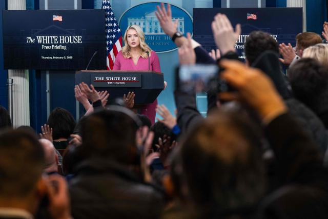 Reporters raise their hands to ask questions as White House Press Secretary Karoline Leavitt speaks during a press briefing in the Brady Press Briefing Room of the White House in Washington, DC, February 5, 2026. (Photo by SAUL LOEB / AFP)