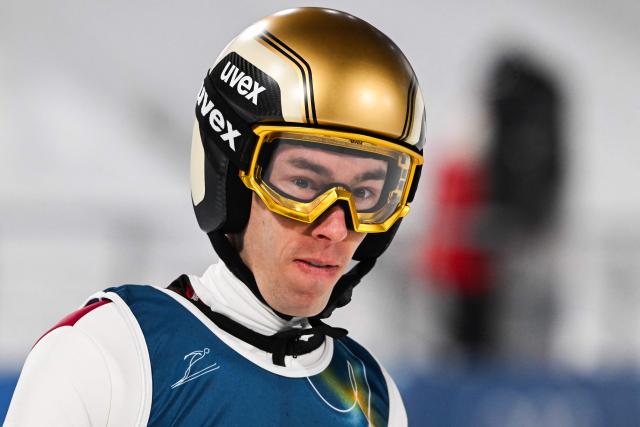 Austria's Stefan Kraft reacts after a jump during the men's ski jumping normal hill training of the Milano Cortina 2026 Winter Olympic Games at Predazzo Ski Jumping Stadium in Predazzo (Val di Fiemme), on February 5, 2026. (Photo by Javier SORIANO / AFP)