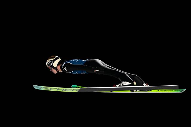 Norway's Kristoffer Eriksen Sundal jumps during the men's ski jumping normal hill training of the Milano Cortina 2026 Winter Olympic Games at Predazzo Ski Jumping Stadium in Predazzo (Val di Fiemme), on February 5, 2026. (Photo by Tobias SCHWARZ / AFP)