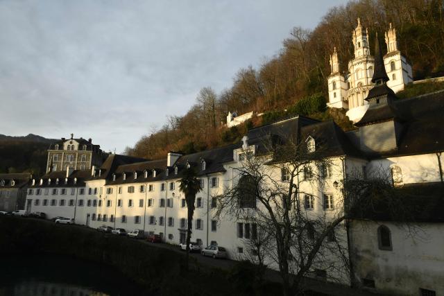 (FILES) This photograph shows a general view of "Le beau rameau", a French Catholic secondary school and highschool complex in Lestelle-Betharram, south-western France, on February 21, 2025. A second man, a clergyman in his sixties, has been charged with "rape by a person in authority" in the Notre-Dame-de-Bétharram case, a private school in the Southwest targeted by nearly 250 complaints from former students, the Pau prosecutor's office said on February 5, 2026. (Photo by Gaizka IROZ / AFP)
