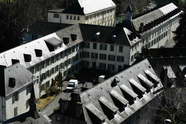 (FILES) This photograph shows a general view of "Le beau rameau", a French Catholic secondary school and highschool complex in Lestelle-Betharram, south-western France, on March 6, 2024. A second man, a clergyman in his sixties, has been charged with "rape by a person in authority" in the Notre-Dame-de-Bétharram case, a private school in the Southwest targeted by nearly 250 complaints from former students, the Pau prosecutor's office said on February 5, 2026. (Photo by GAIZKA IROZ / AFP)