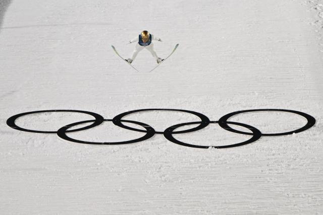 Austria's Stefan Kraft jumps during the men's ski jumping normal hill training of the Milano Cortina 2026 Winter Olympic Games at Predazzo Ski Jumping Stadium in Predazzo (Val di Fiemme), on February 5, 2026. (Photo by Javier SORIANO / AFP)