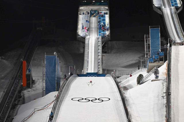 USA's Jason Colby jumps during the men's ski jumping normal hill training of the Milano Cortina 2026 Winter Olympic Games at Predazzo Ski Jumping Stadium in Predazzo (Val di Fiemme), on February 5, 2026. (Photo by Javier SORIANO / AFP)