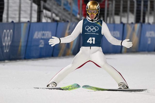 Austria's Stefan Kraft arrives in the finish area after jumping during the men's ski jumping normal hill training of the Milano Cortina 2026 Winter Olympic Games at Predazzo Ski Jumping Stadium in Predazzo (Val di Fiemme), on February 5, 2026. (Photo by Javier SORIANO / AFP)
