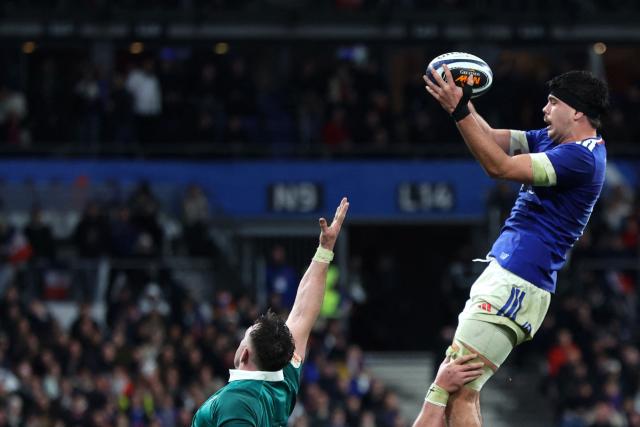 France's flanker Oscar Jegou catches the ball in a line out during the Six Nations international rugby union match between France and Ireland at the Stade de France in Saint-Denis, Paris' suburb, on February 5, 2026. (Photo by Alain JOCARD / AFP)