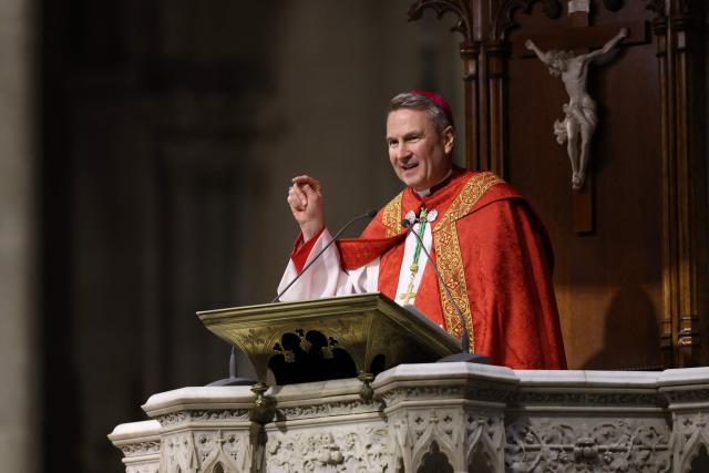 Archibishop-designate Ronald Hicks leads service during Solemn Vespers evening prayer service, ahead of his installation as New York Archbishop at St. Patrick's Cathedral in New York on February 5, 2026. In a significant shift for the US Catholic Church, Pope Leo XIV replaced Timothy Dolan, who stepped down after reaching the church's retirement age of 75, with Hicks, a 58-year-old bishop from Illinois. (Photo by ANGELA WEISS / AFP)