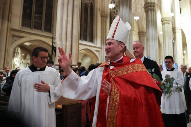 Archibishop-designate Ronald Hicks exits after Solemn Vespers evening prayer service, ahead of his installation as New York Archbishop at St. Patrick's Cathedral in New York on February 5, 2026. In a significant shift for the US Catholic Church, Pope Leo XIV replaced Timothy Dolan, who stepped down after reaching the church's retirement age of 75, with Hicks, a 58-year-old bishop from Illinois. (Photo by ANGELA WEISS / AFP)