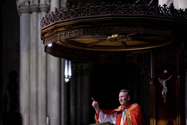 Archibishop-designate Ronald Hicks speaks during Solemn Vespers evening prayer service, ahead of his installation as New York Archbishop at St. Patrick's Cathedral in New York on February 5, 2026. In a significant shift for the US Catholic Church, Pope Leo XIV replaced Timothy Dolan, who stepped down after reaching the church's retirement age of 75, with Hicks, a 58-year-old bishop from Illinois. (Photo by Leonardo Munoz / AFP)
