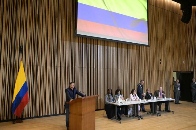 Colombian President Gustavo Petro (L) speaks during a meeting with members of the Colombian diaspora at the Martin Luther King Jr. Memorial Library in Washington, DC, on February 5, 2026. (Photo by Oliver Contreras / AFP)