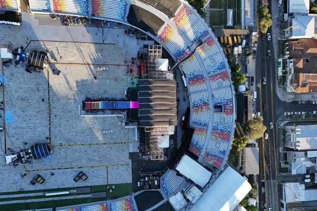 This aerial view shows the stage set up inside the Jorge "El Magico" Gonzalez Stadium ahead of her worldwide 'Las Mujeres ya no Lloran' tour in San Salvador on February 5, 2026. (Photo by Marvin RECINOS / AFP)