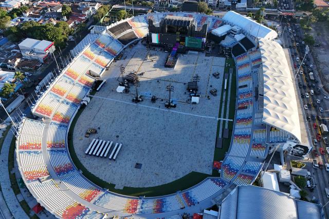 This aerial view shows the stage set up inside the Jorge "El Magico" Gonzalez Stadium ahead of her worldwide 'Las Mujeres ya no Lloran' tour in San Salvador on February 5, 2026. (Photo by Marvin RECINOS / AFP)