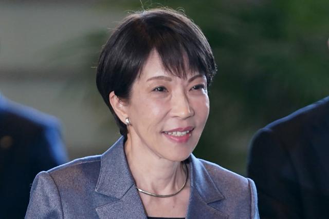 This photo taken on February 5, 2026 shows Japan's Prime Minister Sanae Takaichi entering the Prime Minister's office between election campaign activities in Tokyo. Sanae Takaichi, a staunch conservative who admires Margaret Thatcher, became Japan's first woman prime minister in October but has shown little appetite for framing her leadership around gender. (Photo by Kazuhiro NOGI / AFP) / To go with AFP story Japan-vote-Takaichi, PROFILE