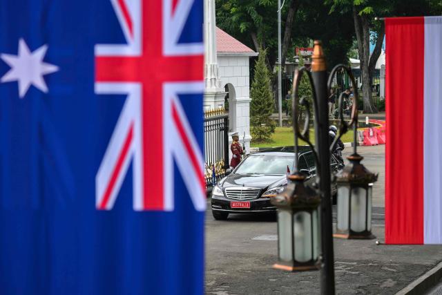 Australian Prime Minister Anthony Albanese’s motorcade enters the grounds of the Merdeka Palace in Jakarta on February 6, 2026, ahead of a meeting with Indonesian President Prabowo Subianto. (Photo by BAY ISMOYO / AFP)