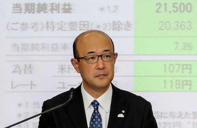 (FILES) This photo taken on November 7, 2019 shows Toyota Motor's operating officer Kenta Kon attending a press conference to announce the company's financial results in Tokyo. Toyota said on February 6, 2026 that its chief executive Koji Sato will be replaced by finance chief Kenta Kon after three years in charge, effective April 1. (Photo by JIJI PRESS / AFP) / Japan OUT