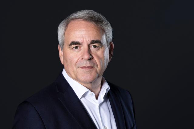 (FILES) Hauts-de-France Regional Council President Xavier Bertrand poses during a photo session in Paris on August 28, 2025. While presidential candidates are popping up left and right, Xavier Bertrand (LR) is forging his own path to the Elysee Palace, bypassing the primaries and positioning himself as a bulwark against the National Rally and La France Insoumise. (Photo by Alain JOCARD / AFP)