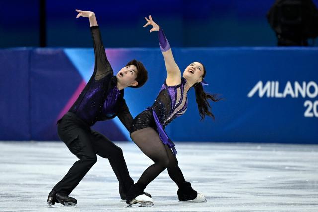 Japan's Utana Yoshida (R) and Japan's Masaya Morita compete in the figure skating team event ice dance-rhythm dance during the Milano Cortina 2026 Winter Olympic Games at Milano Ice Skating Arena in Milan on February 6, 2026. (Photo by WANG Zhao / AFP)