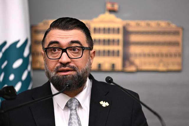 Syria's Justice Minister Mazhar al-Wais speaks during a joint press conference with the Lebanese deputy prime minister following the signing of a prisoner swap agreement, at the Grand Serail (Government Palace) in Beirut on February 6, 2026. (Photo by JOSEPH EID / AFP)