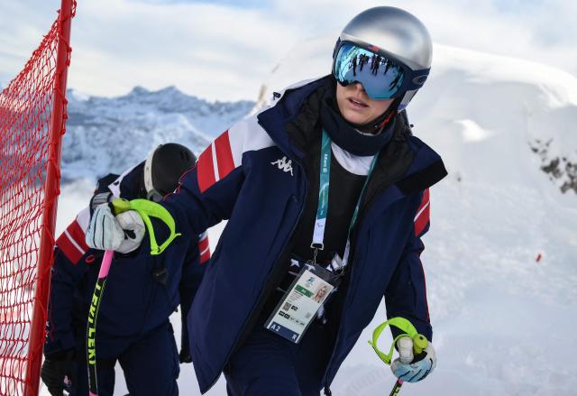 USA's Lindsey Vonn arrives at the warmup before the second official training for the women's downhill event ahead of the Milano Cortina 2026 Winter Olympic Games at the Tofane Alpine Skiing Centre in Cortina d’Ampezzo on February 6, 2026. (Photo by Marco BERTORELLO / AFP)
