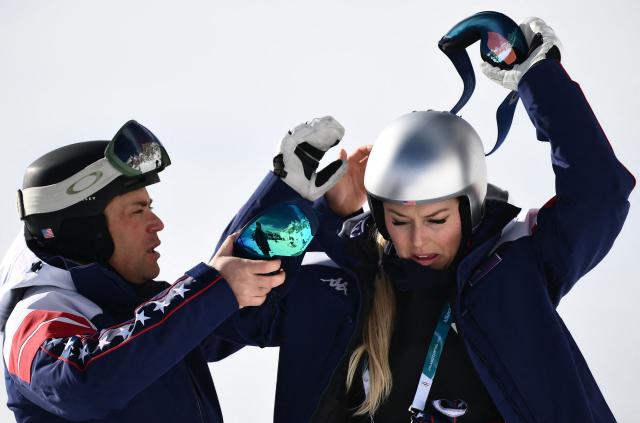 USA's Lindsey Vonn adjusts her ski mask before the second official training for the women's downhill event ahead of the Milano Cortina 2026 Winter Olympic Games at the Tofane Alpine Skiing Centre in Cortina d’Ampezzo on February 6, 2026. (Photo by Marco BERTORELLO / AFP)