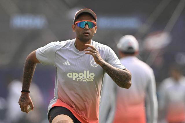 India's captain Suryakumar Yadav warms up during training session on the eve of the 2026 ICC Men's T20 Cricket World Cup match against United States, at the Wankhede Stadium in Mumbai on February 6, 2026. India captain Suryakumar Yadav admitted on February 6 "there will be nerves" when India open their T20 World Cup campaign in front of more than 30,000 fanatical home supporters in Mumbai, but vowed to give them "entertainment". (Photo by Punit PARANJPE / AFP)