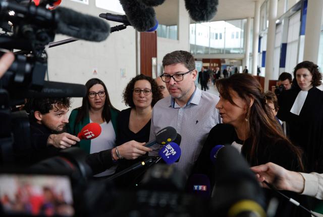 (FILES) Evaelle's parents (2L and C), flanked by their lawyer Delphine Meillet (2R) speak to the press during the opening hearing of the trial of a teacher for having "degraded the living conditions" of Evaelle, a middle school student who committed suicide at 11 years old in 2019, at Pontoise courthouse, on March 10, 2025. The appeal trial of Evaelle's teacher for harassment will begin at the Versailles courthouse on February 9, 2026. (Photo by GEOFFROY VAN DER HASSELT / AFP)