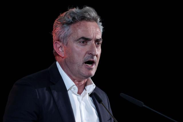 (FILES) French senator from the far-right "Reconquete!" party, Stephane Ravier, speaks during a meeting of the French far-right "Reconquete!" political party ahead of the upcoming European Parliament Elections, in Palavas-les-Flots, southern France, on April 6, 2024. The Marseille courhouse will deliver its ruling on February 10, 2026 in the appeal trial of far-right senator Stéphane Ravier, who is being tried for employing his son. (Photo by Pascal GUYOT / AFP)