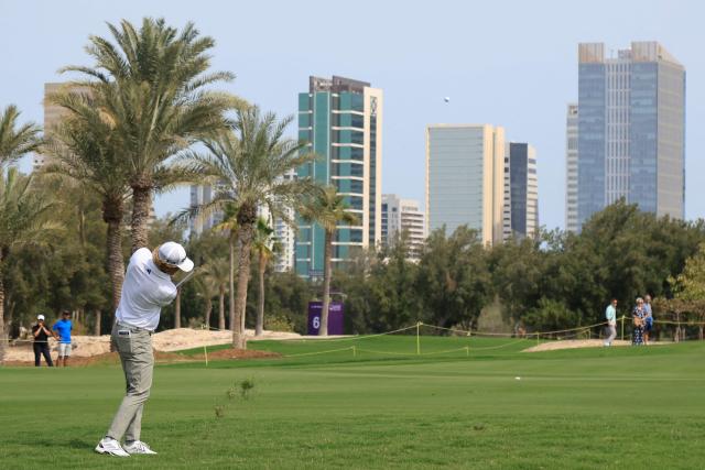France's Martin Couvra plays a shot on the 2nd hole during the second day of the Qatar Masters 2026 golf tournament at Doha Golf Club in Doha on February 6, 2026. (Photo by Karim JAAFAR / AFP)