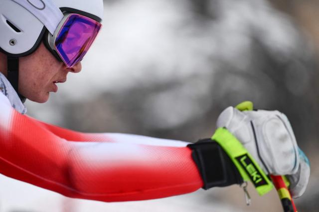 Switzerland's Jasmine Flury takes the start in the second official training for the women's downhill event ahead of the Milano Cortina 2026 Winter Olympic Games at the Tofane Alpine Skiing Centre in Cortina d’Ampezzo on February 6, 2026. (Photo by Marco BERTORELLO / AFP)