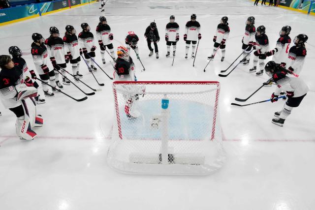 Team Japan gathers prior the women's preliminary round Group B Ice Hockey match between France and Japan at the Milano Rho Ice Hockey Arena at the Milano Cortina 2026 Winter Olympic Games in Milan, on February 6, 2026. (Photo by Carolyn Kaster / POOL / AFP)