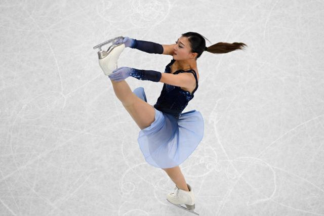 Japan's Kaori Sakamoto competes in the figure skating women's single short program team event during the Milano Cortina 2026 Winter Olympic Games at Milano Ice Skating Arena in Milan on February 6, 2026. (Photo by Antonin THUILLIER / AFP)