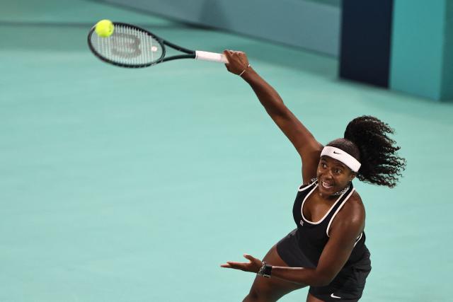 TOPSHOT - USA's Hailey Baptiste serves against Russia’s Ekaterina Alexandrova during their women’s singles semi-final match at the Abu Dhabi Open tennis tournament in Abu Dhabi on February 6, 2026. (Photo by Fadel SENNA / AFP)