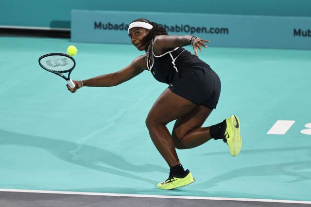 USA's Hailey Baptiste hits a return against Russia’s Ekaterina Alexandrova during their women’s singles semi-final match at the Abu Dhabi Open tennis tournament in Abu Dhabi on February 6, 2026. (Photo by Fadel SENNA / AFP)