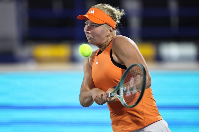 Denmark’s Clara Tauson hits a return Czech Republic's Sara Bejlek during their women’s singles semi-final match at the Abu Dhabi Open tennis tournament in Abu Dhabi on February 6, 2026. (Photo by Fadel SENNA / AFP)