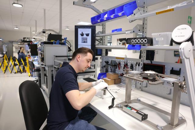 An employee works at the industrial site 'Spacecraft Propulsion' of French multinational aerospace and defence corporation Safran in Vernon on February 6, 2026. (Photo by Thomas SAMSON / AFP)