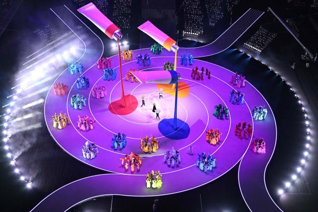 Dancers perform during the opening ceremony of the Milano Cortina 2026 Winter Olympic Games at the San Siro stadium in Milan, northern Italy, on February 6, 2026. (Photo by Antonin THUILLIER / AFP)