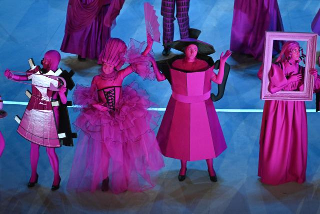 Dancers perform during the opening ceremony of the Milano Cortina 2026 Winter Olympic Games at the San Siro stadium in Milan, northern Italy, on February 6, 2026. (Photo by Piero CRUCIATTI / AFP)