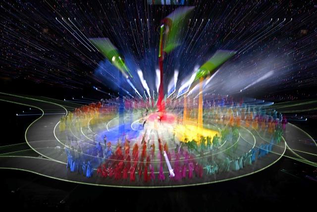 Dancers perform during the opening ceremony of the Milano Cortina 2026 Winter Olympic Games at the San Siro stadium in Milan, northern Italy, on February 6, 2026. (Photo by Gabriel BOUYS / AFP)