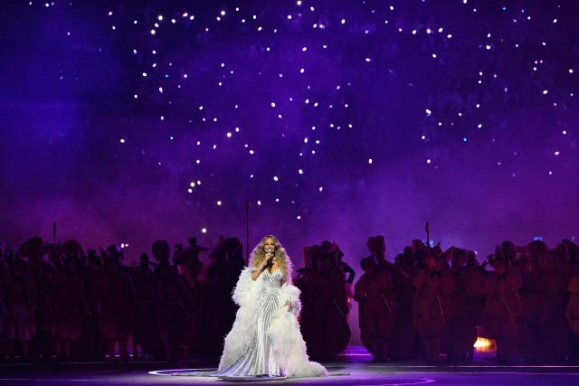 US singer Mariah Carey performs during the opening ceremony of the Milano Cortina 2026 Winter Olympic Games at the San Siro stadium in Milan, northern Italy, on February 6, 2026. (Photo by WANG Zhao / AFP)
