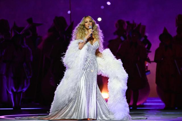 US singer Mariah Carey performs during the opening ceremony of the Milano Cortina 2026 Winter Olympic Games at the San Siro stadium in Milan, northern Italy, on February 6, 2026. (Photo by WANG Zhao / AFP)