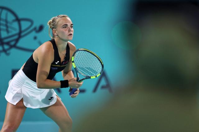 The Czech Republic's Sara Bejlek anticipates a shot in her women’s singles semi-final match against Denmark’s Clara Tauson during the Abu Dhabi Open tennis tournament in Abu Dhabi on February 6, 2026. (Photo by Fadel SENNA / AFP)