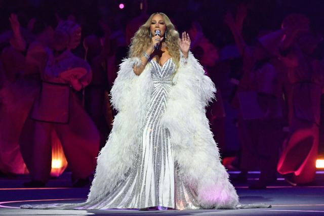 US singer Mariah Carey performs during the opening ceremony of the Milano Cortina 2026 Winter Olympic Games at the San Siro stadium in Milan, northern Italy, on February 6, 2026. (Photo by WANG Zhao / AFP)